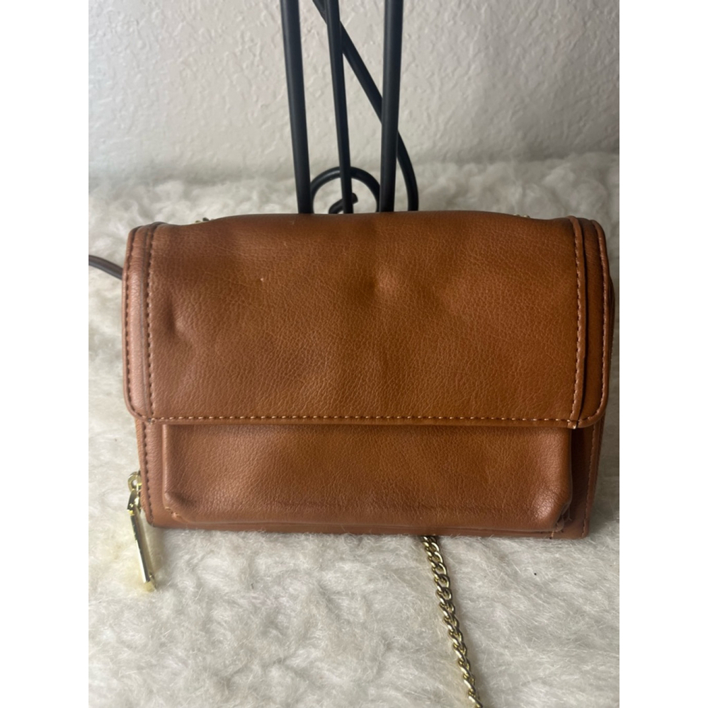 Enzo Angiolini crossbody bag with a flap closure and a chain strap.